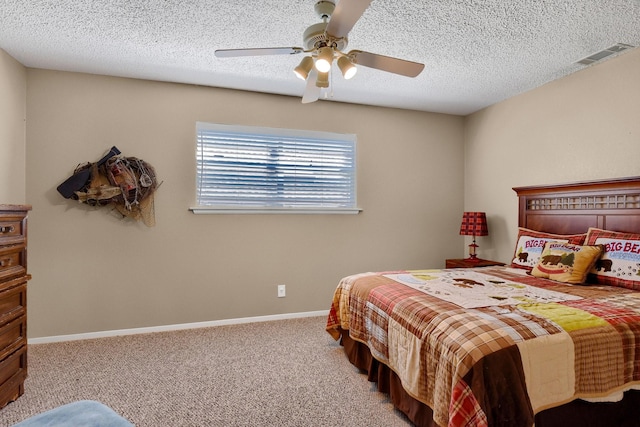 bedroom with light colored carpet, visible vents, ceiling fan, a textured ceiling, and baseboards