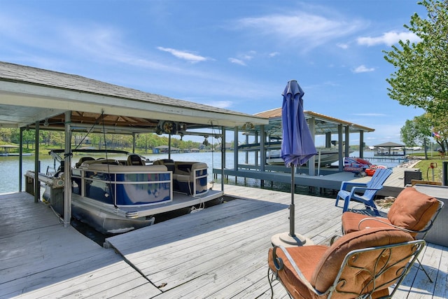 dock area featuring a water view and boat lift