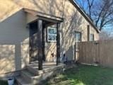 view of front of home with fence