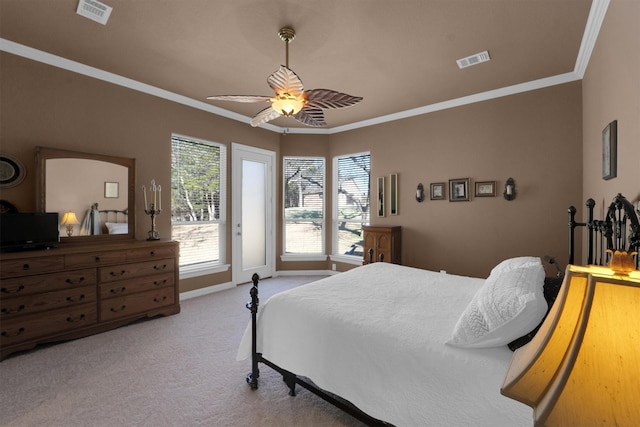 bedroom featuring access to outside, visible vents, crown molding, and light carpet