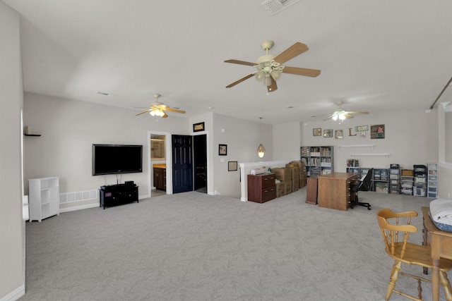 carpeted living area with visible vents