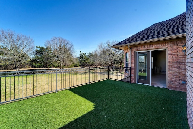 view of yard with fence