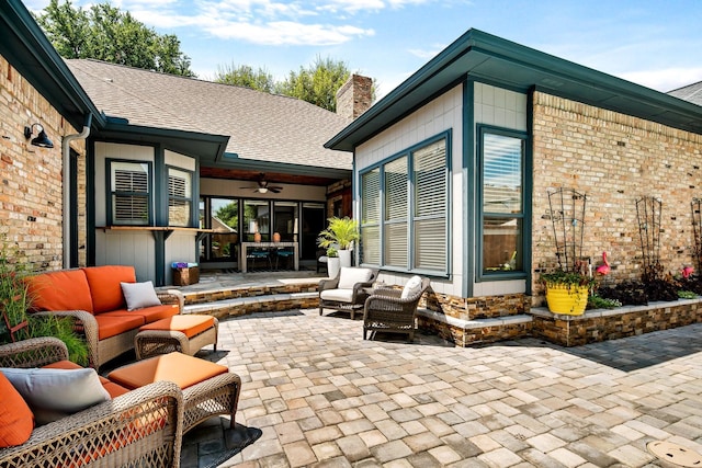 view of patio / terrace featuring ceiling fan and an outdoor hangout area