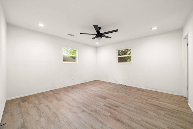 2209 9th St, Brownwood, TX 76801 - spare room with wood finished floors, recessed lighting, ceiling fan, and baseboards
