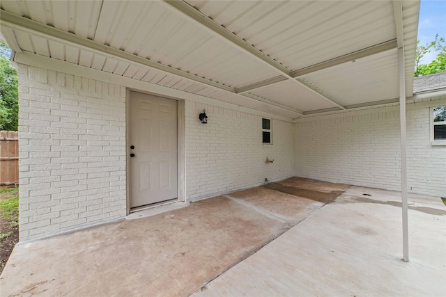 2209 9th St, Brownwood, TX 76801 - view of patio / terrace with an attached carport