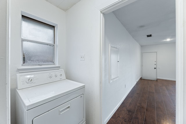 washroom featuring laundry area, baseboards, washer / clothes dryer, and dark wood-style flooring