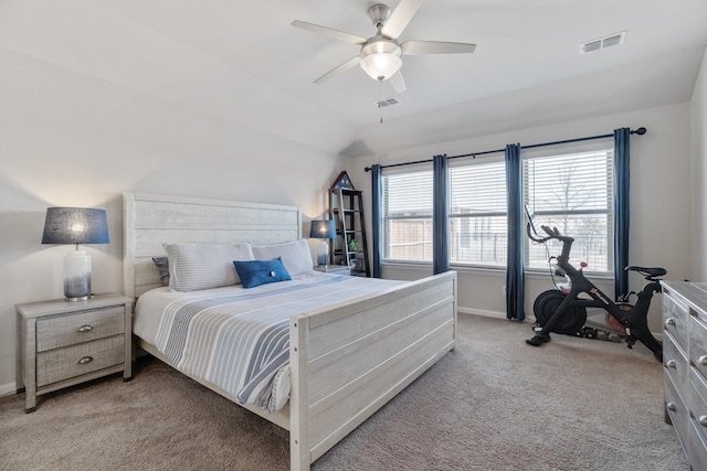 bedroom featuring light carpet, baseboards, visible vents, and ceiling fan