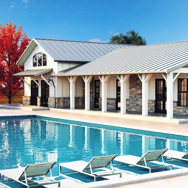 outdoor pool featuring a patio