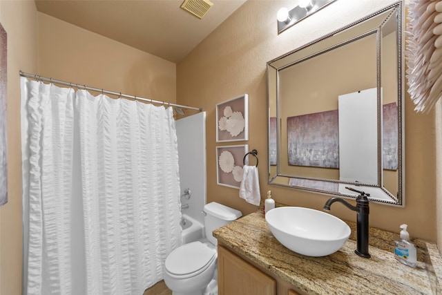 full bathroom with vanity, toilet, and shower / bath combination with curtain