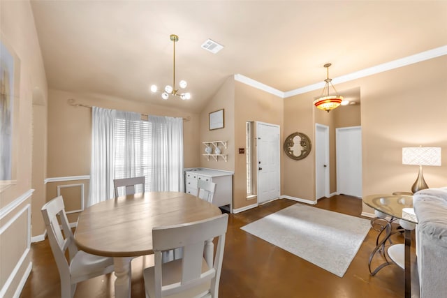 dining space featuring a chandelier, baseboards, crown molding, and dark wood finished floors