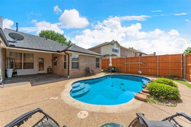 view of pool with a patio area and a fenced backyard