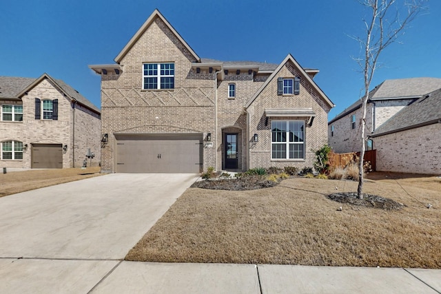 view of front facade with an attached garage, concrete driveway, and brick siding