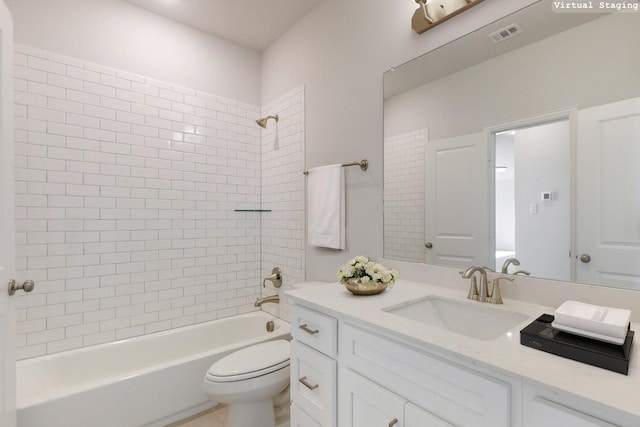 full bathroom featuring visible vents, shower / bathing tub combination, vanity, and toilet