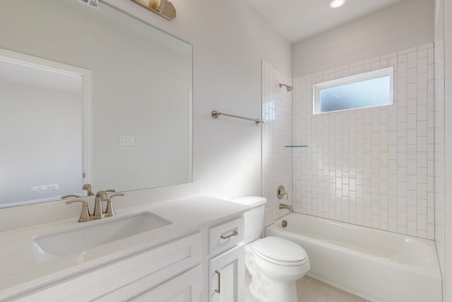 full bathroom featuring tile patterned flooring, shower / bathing tub combination, vanity, and toilet