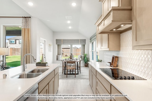 13133 Yellowstone Way, Providence Village, TX 76227 - kitchen with light countertops, a sink, custom exhaust hood, and black electric cooktop