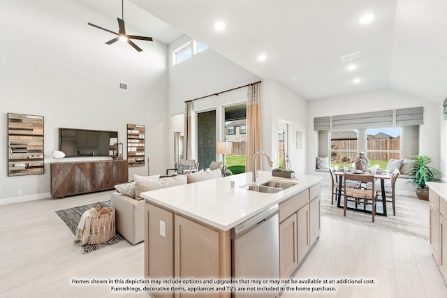 13133 Yellowstone Way, Providence Village, TX 76227 - kitchen with light countertops, open floor plan, a sink, an island with sink, and dishwasher