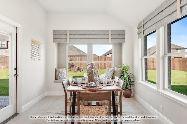 13133 Yellowstone Way, Providence Village, TX 76227 - dining space with vaulted ceiling, baseboards, and a healthy amount of sunlight