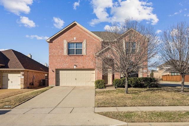 traditional-style house with driveway, brick siding, an attached garage, central air condition unit, and a front yard