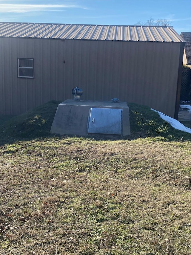 entry to storm shelter with a yard