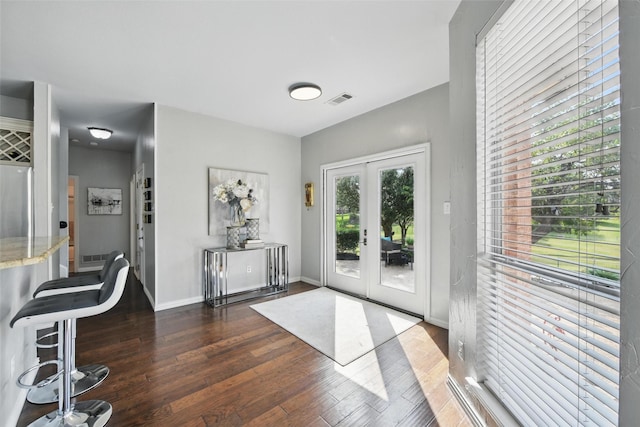 2781 Timber Crest Ln, Highland Village, TX 75077 - entryway featuring french doors, wood finished floors, and baseboards
