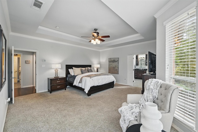 2781 Timber Crest Ln, Highland Village, TX 75077 - bedroom featuring a tray ceiling, carpet, baseboards, ornamental molding, and a ceiling fan