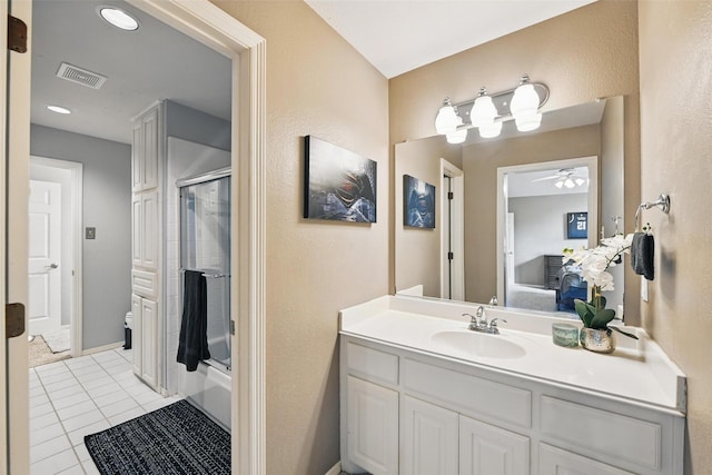 2781 Timber Crest Ln, Highland Village, TX 75077 - full bathroom with tile patterned floors, vanity, shower / bath combination with glass door, and a ceiling fan