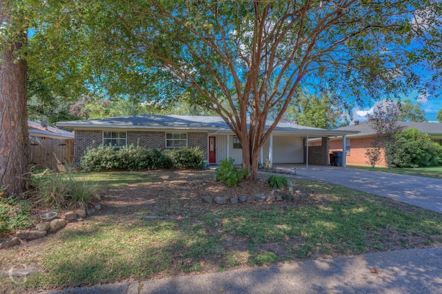 4606 Tibbs St, Shreveport, LA 71105 - ranch-style house featuring driveway, brick siding, and a carport
