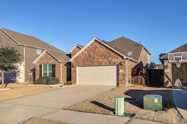 view of front of home with a garage, brick siding, a shingled roof, fence, and concrete driveway