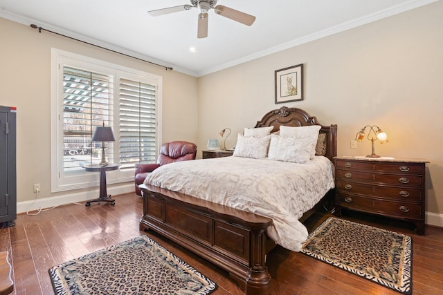 bedroom with baseboards, ornamental molding, ceiling fan, and wood finished floors