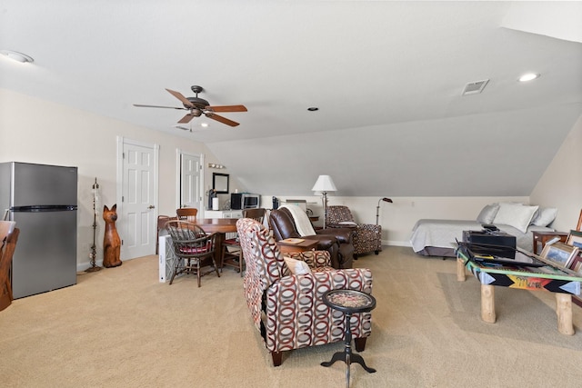 interior space featuring lofted ceiling, light colored carpet, visible vents, and recessed lighting