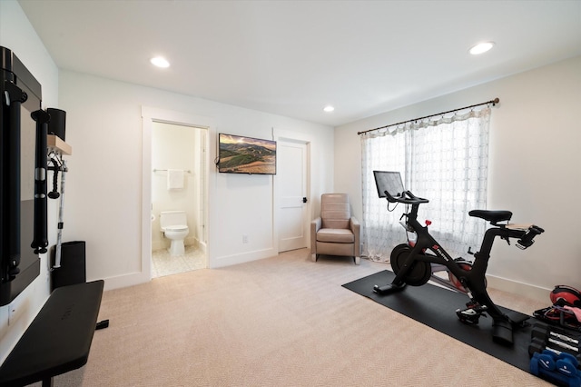 workout area with light carpet, baseboards, and recessed lighting