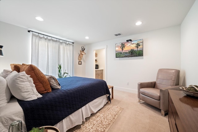 bedroom with light carpet, visible vents, and recessed lighting