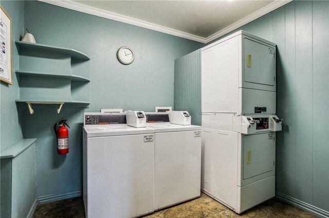 4112 Bowser Ave Unit 203, Dallas, TX 75219 - common laundry area with washing machine and clothes dryer, crown molding, and stacked washer and clothes dryer