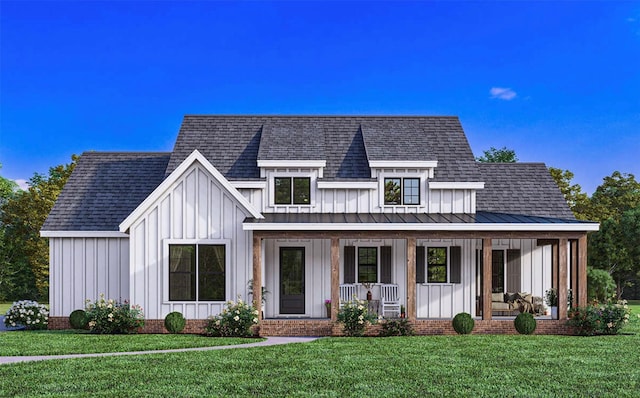 modern farmhouse featuring board and batten siding, a front yard, covered porch, and a shingled roof