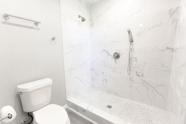 3321 Old Hickory Trl, Forest Hill, TX 76140 - full bath with wood finished floors, double vanity, and baseboards