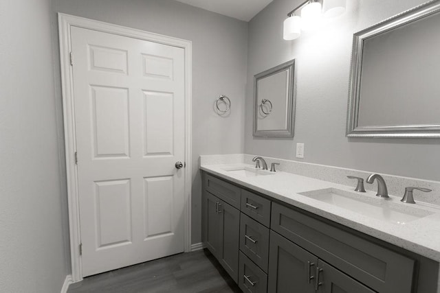 3321 Old Hickory Trl, Forest Hill, TX 76140 - full bath with wood finished floors, double vanity, and baseboards