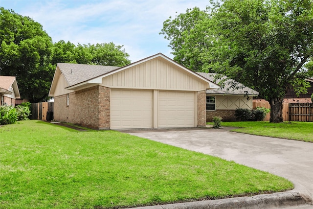 3321 Old Hickory Trl, Forest Hill, TX 76140 - view of front of property with an attached garage, concrete driveway, brick siding, and roof with shingles