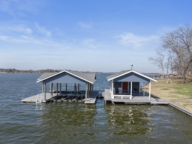 view of dock with a water view and boat lift