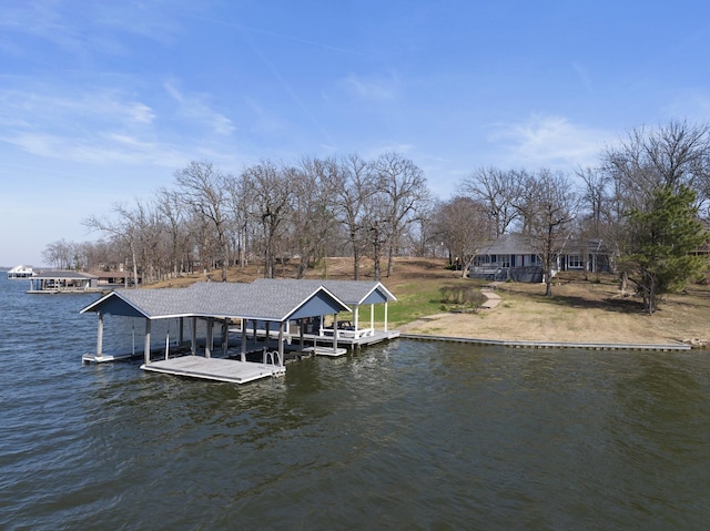 view of dock featuring a water view and boat lift