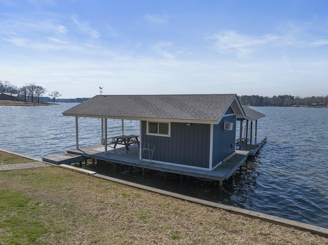 dock area featuring a water view and boat lift