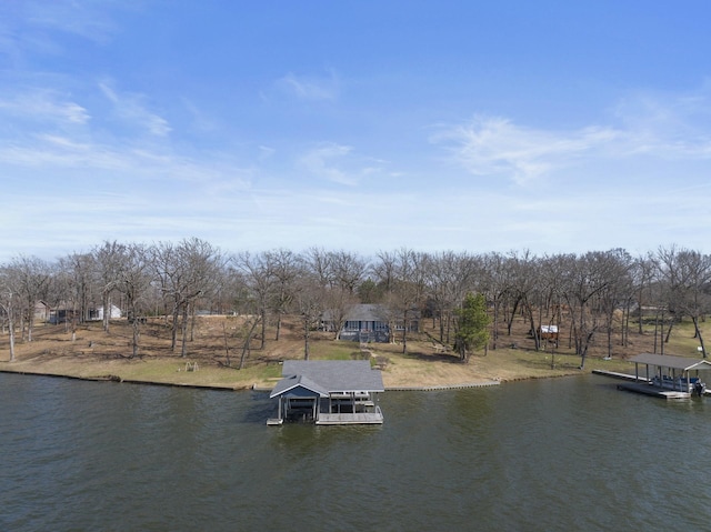 view of dock featuring a water view and boat lift