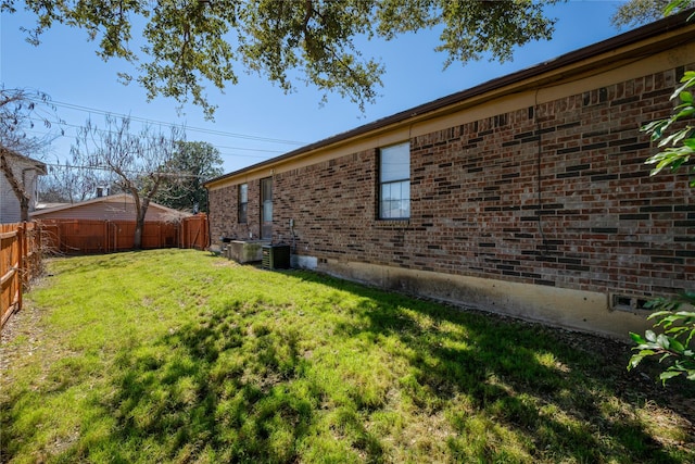 view of yard featuring a fenced backyard and cooling unit