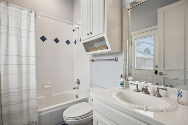 full bath featuring toilet, shower / bathtub combination with curtain, and vanity