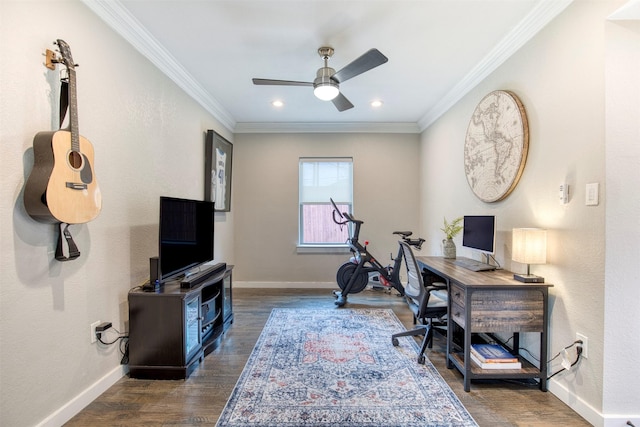 office space featuring baseboards, ornamental molding, dark wood finished floors, and a ceiling fan