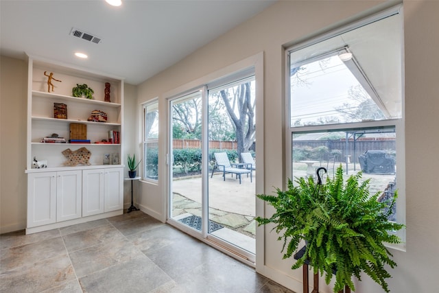 entryway featuring recessed lighting, visible vents, and baseboards