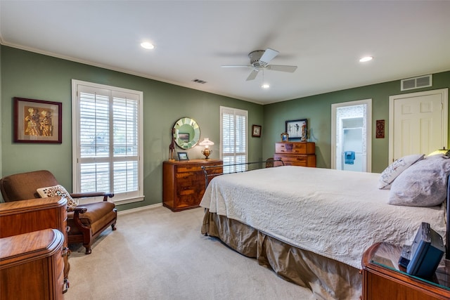 bedroom featuring a ceiling fan, recessed lighting, visible vents, and light carpet