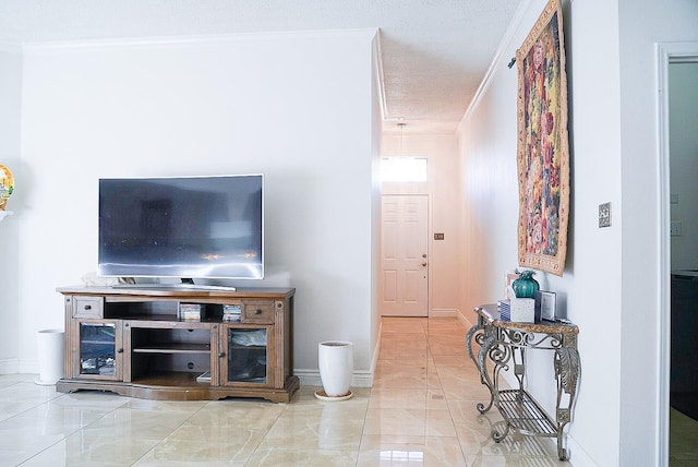 living room with baseboards and crown molding