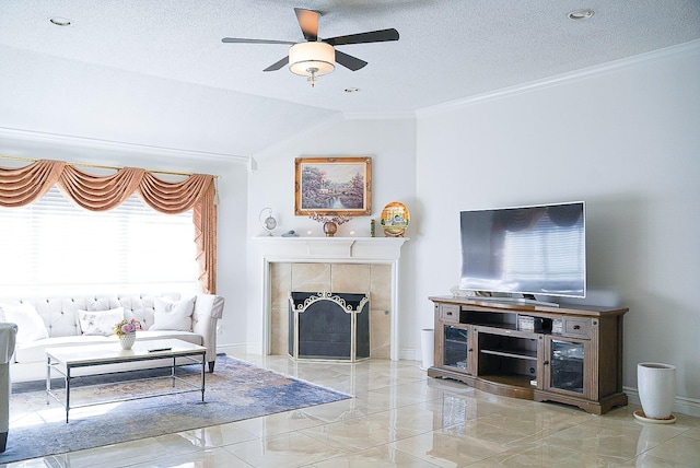 living room with marble finish floor, baseboards, ornamental molding, and a textured ceiling