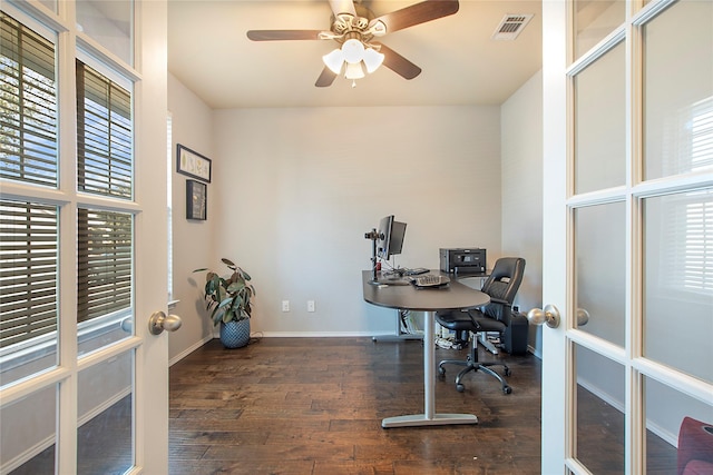 office featuring ceiling fan, dark wood-style flooring, visible vents, baseboards, and french doors