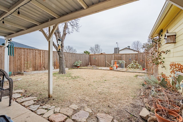 view of yard featuring a fenced backyard